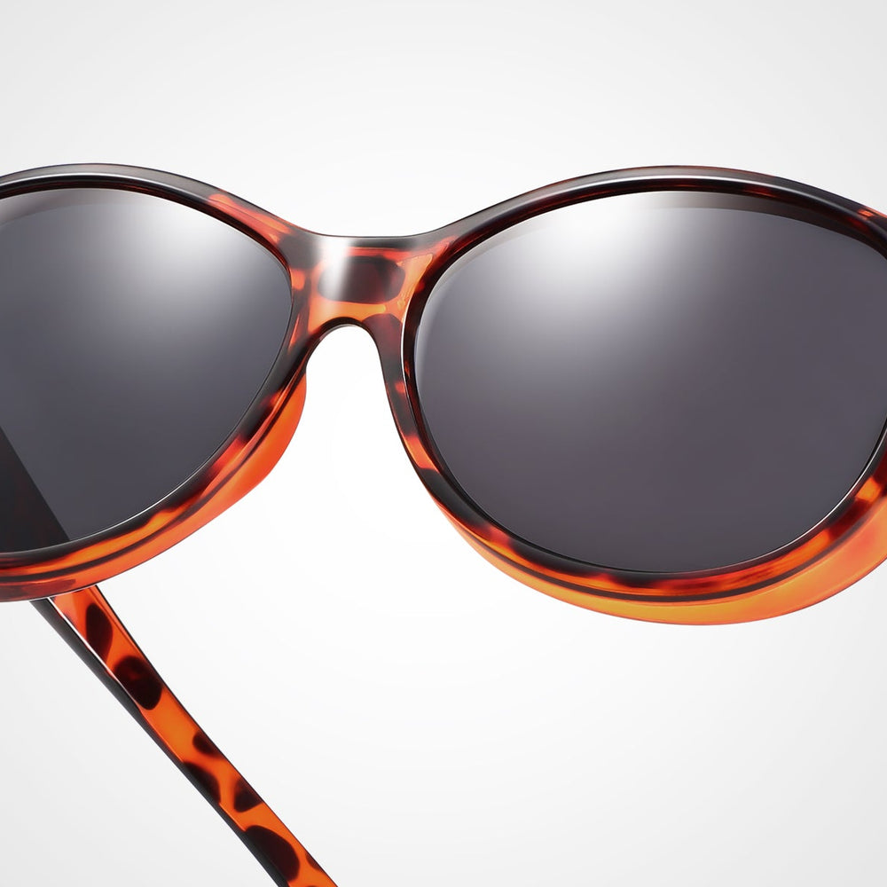 
                      
                        TINHAO Polarized Fit Over Glasses Sunglasses for Women UV Protection, Trendy Oversized Cat Eye Sunglasses for Driving Riding丨 Leopard
                      
                    